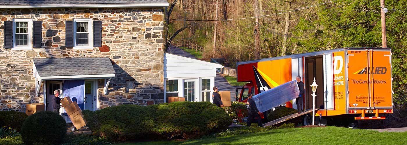 professional movers loading moving truck